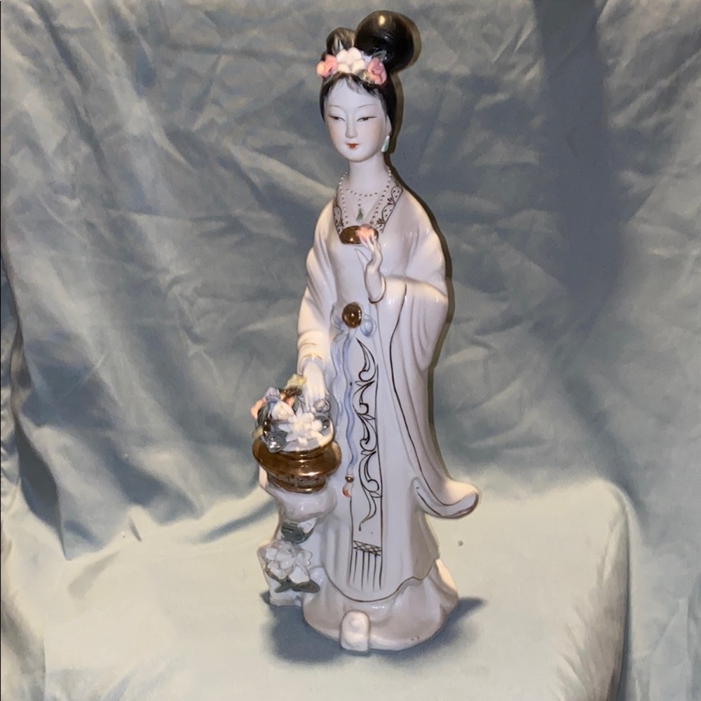 Elegant Porcelain Figurine with Floral Accents